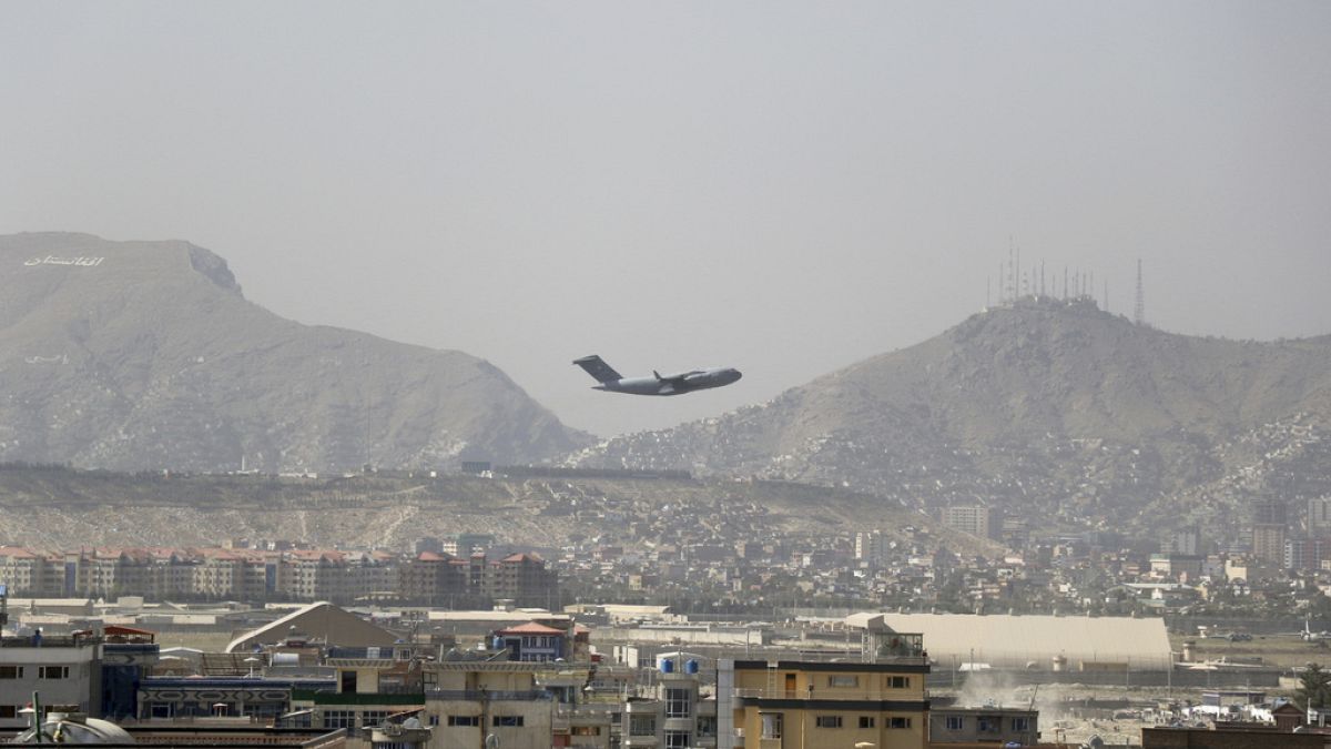 U.S military aircraft takes off at the Hamid Karzai International Airport in Kabul, Afghanistan, Saturday, Aug. 28, 2021.