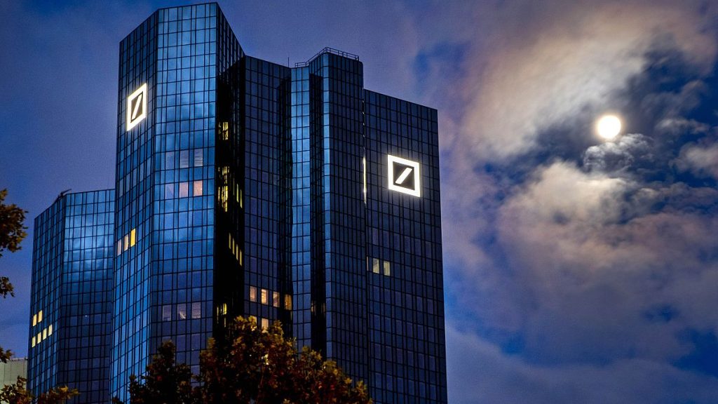 File photo. The moon shines next to the headquarters of the Deutsche Bank in Frankfurt, Germany. 4 October 2020.