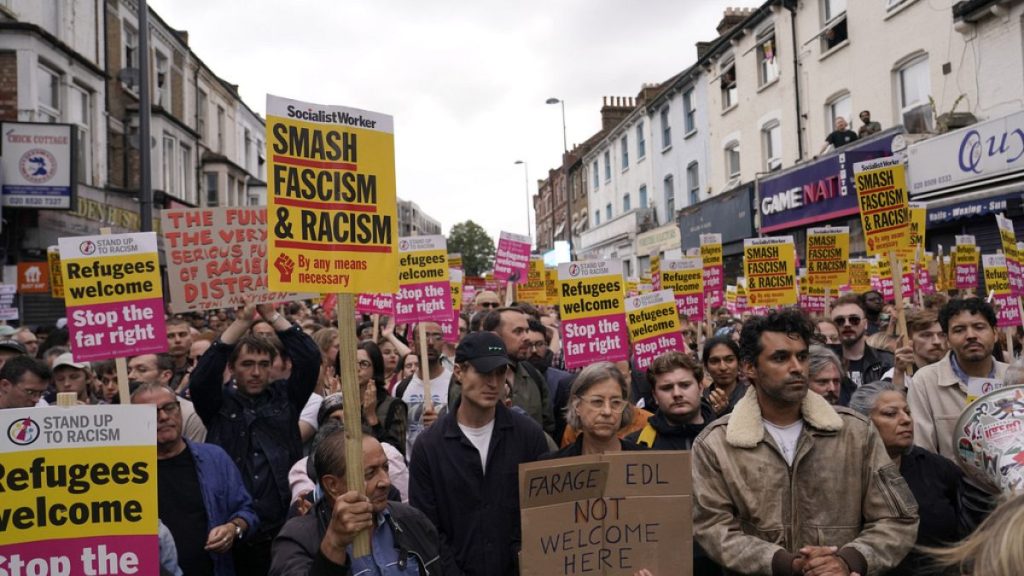 Protesters demonstrate against a planned far-right anti-immigration protest in London, Wednesday, Aug. 7, 2024