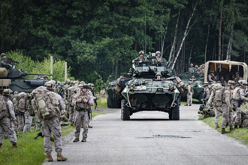 Des véhicules blindés militaires participent à l'exercice Baltops 2024 dans la région de la mer Baltique en juin.