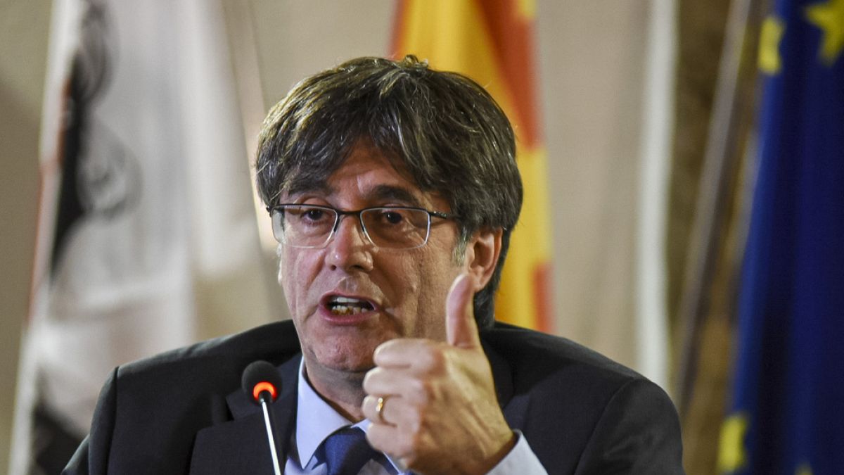 FILE - Catalan leader Carles Puigdemont speaks at a press conference in Alghero, Italy, Oct. 4, 2021.