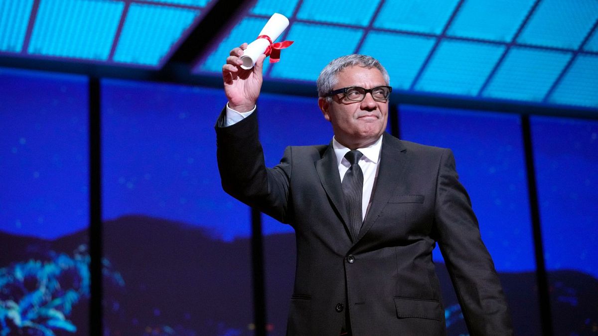 Exiled Iranian director Mohammad Rasoulof to head Busan jury - pictured here: Cannes 2024 - Rasoulof accepts the special prize award for the film