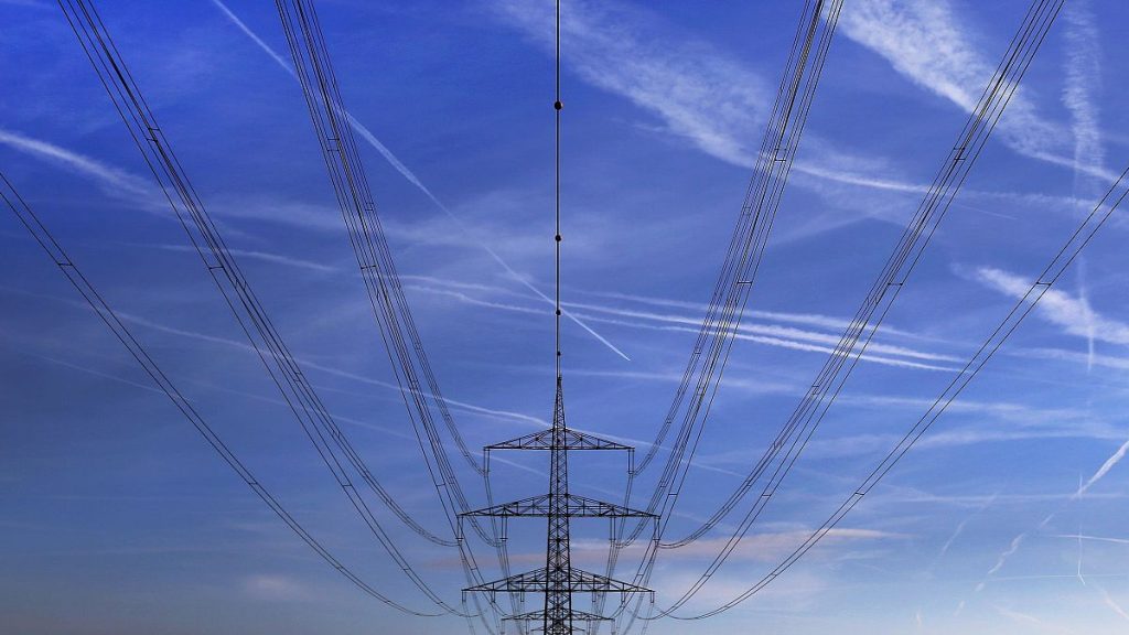 File photo. High power cables hang from a pole on a field in Hattersheim, Germany. 1 November 2017.