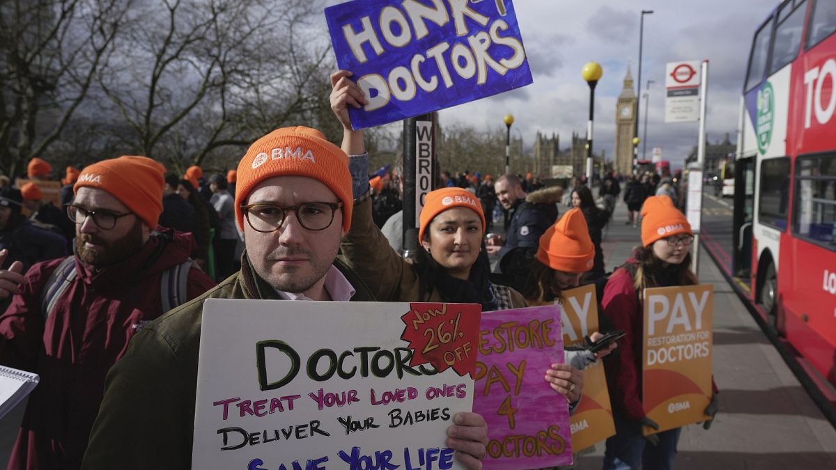 Junior doctors, members of the BMA (British Medical Association), take part in a strike on the picket line outside the St Thomas