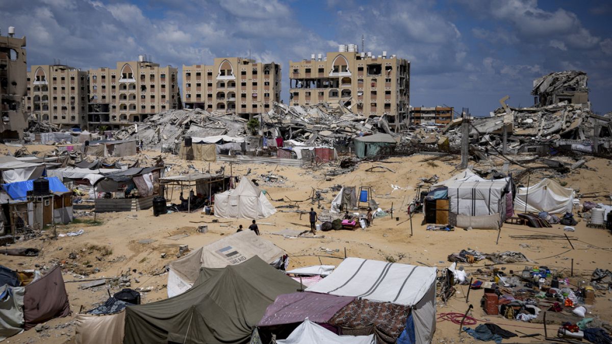 Palestinians displaced by the Israeli air and ground offensive on the Gaza Strip flee from Hamad City, Sunday August 11th 2024