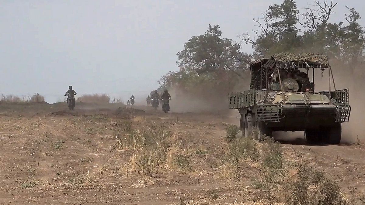 Monday, Aug. 12, 2024, marine assault team members ride motorcycles toward Ukrainian position at an undisclosed location.