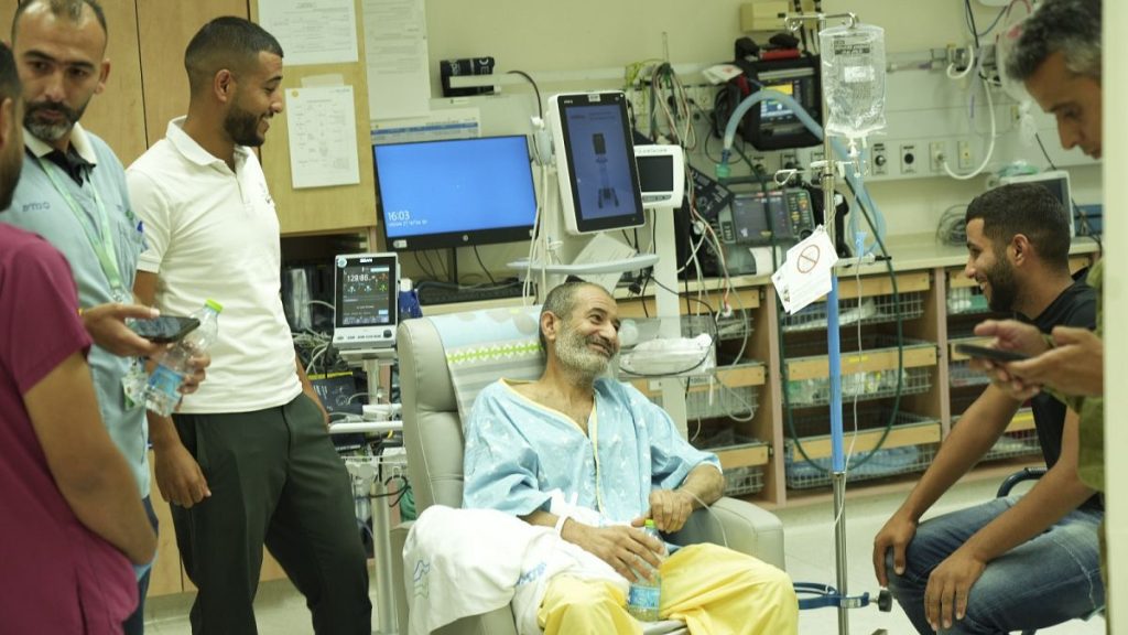 Kaid Farhan Al-Qadi, 52, who was held hostage by Hamas militants in Gaza sits in a room at the Soroka Medical Center in Beersheba, Israel.