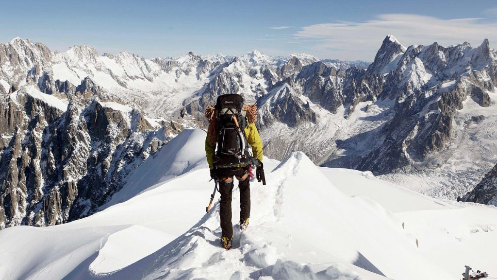 FILE: An alpinist heads down a ridge on the Aiguille du Midi towards the Vallee Blanche on the Mont Blanc massif, in the Alps, near Chamonix, 12 October 2011