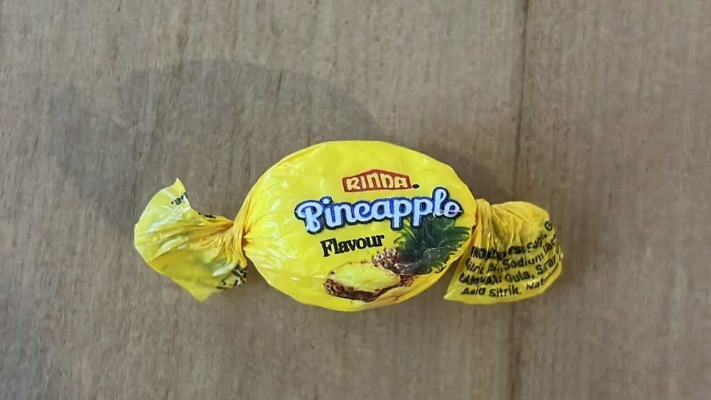 A pineapple-flavoured sweet filled with a potentially lethal dose of methamphetamine is displayed in Auckland, New Zealand, Tuesday, August 13, 2024.