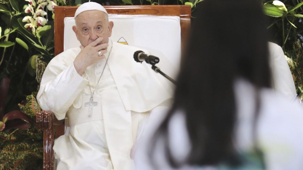 Pope Francis reacts as he listens to a member of the audience at the Grha Pemuda Youth Centre in Jakarta, Indonesia, Wednesday, Sept. 4, 2024.