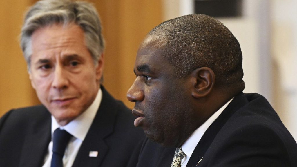 US Secretary of State Antony Blinken, left, listens as UK Foreign Secretary David Lammy, right, speaks during the Fourth Crimea Platform Leaders Summit in Kyiv, Ukraine.