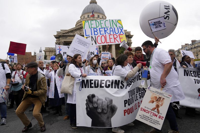 Doctors protest amid a nationwide strike, in front of the Pantheon in Paris, Thursday Jan. 5, 2023.