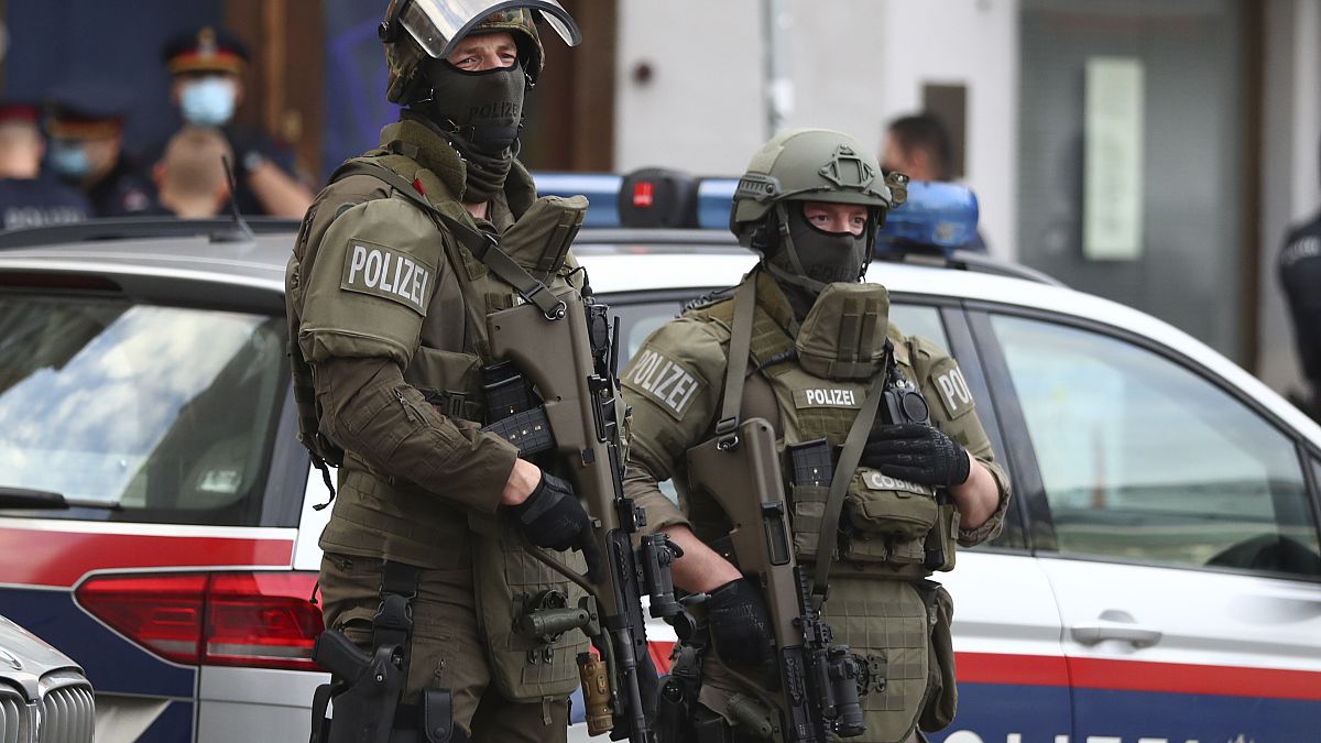 Police officers guard the scene of an attack in Vienna, November 3, 2020