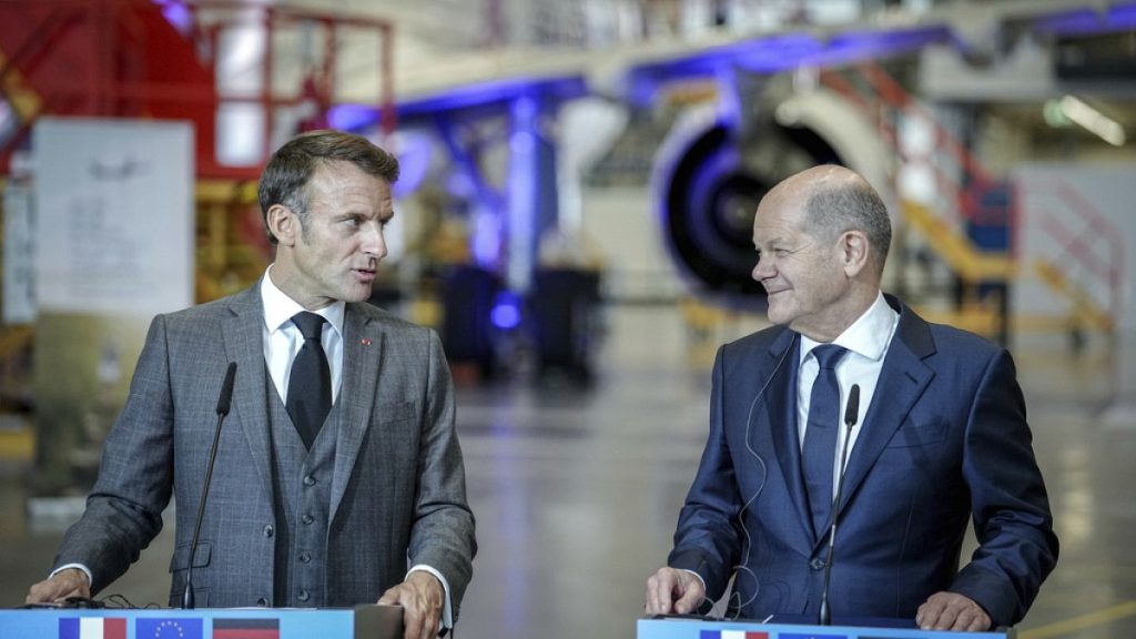 German Chancellor Olaf Scholz (SPD), right, and Emmanuel Macron, President of France, make a joint statement after visiting the Airbus site in Hamburg-Finkenwerder, 2023.