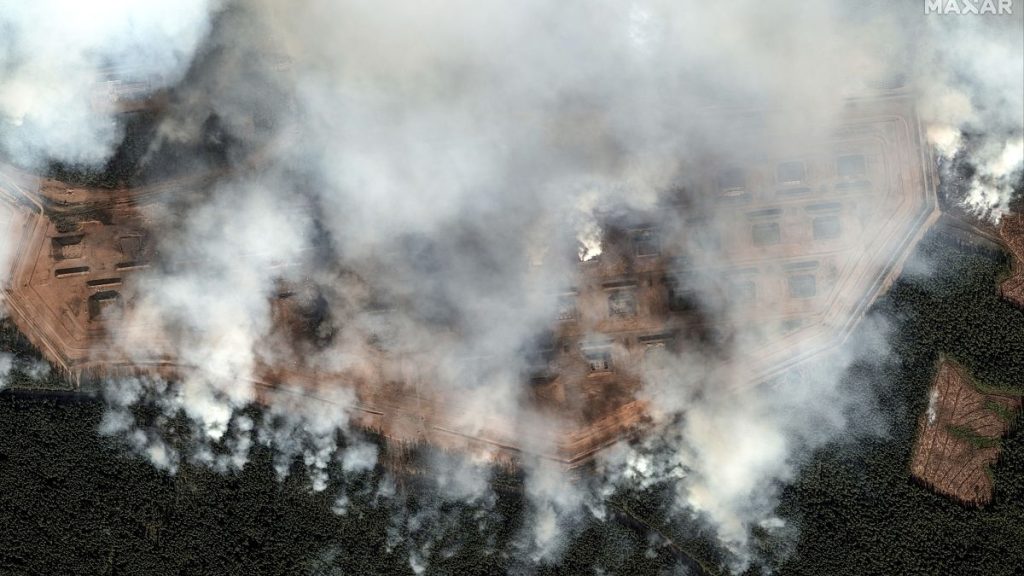 General view of the aftermath of a large series of explosion on an ammunition depot in Toropets, Russia. (Satellite image ©2023 Maxar Technologies)