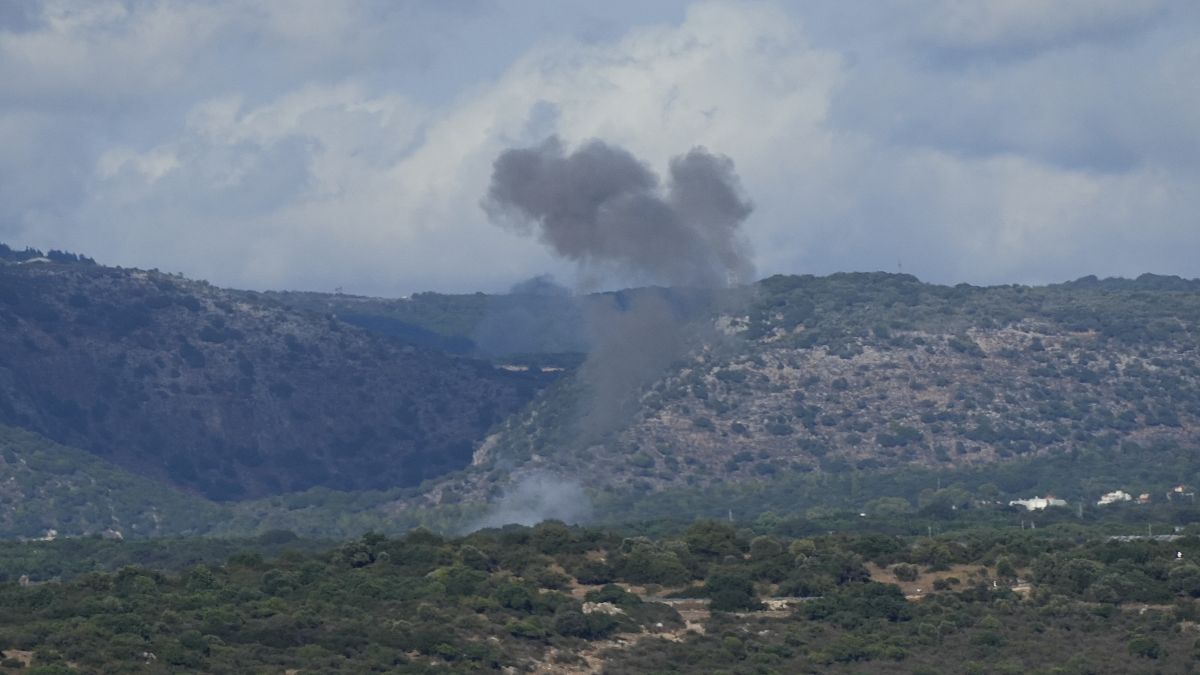 Smoke rises in northern Israel following a rocket strike from Lebanon.