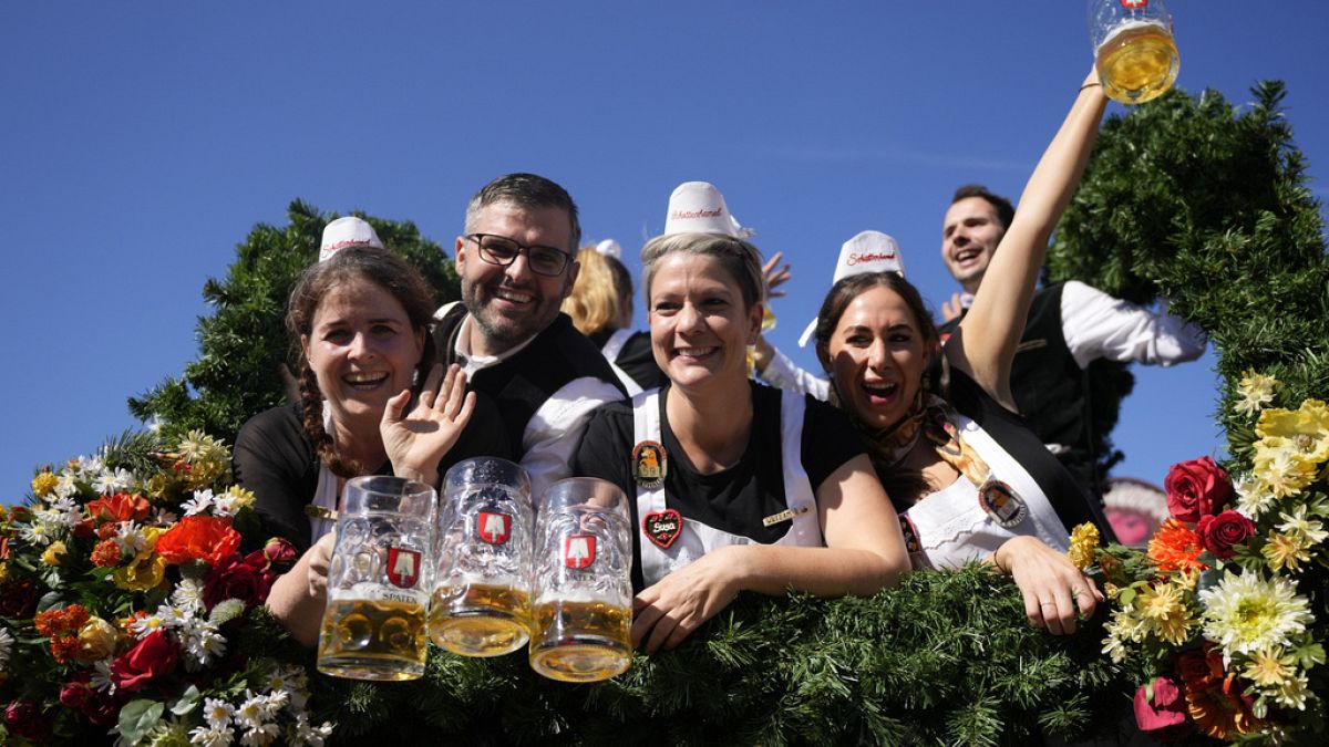 The Oktoberfest hosts arrive for the start of the 189th