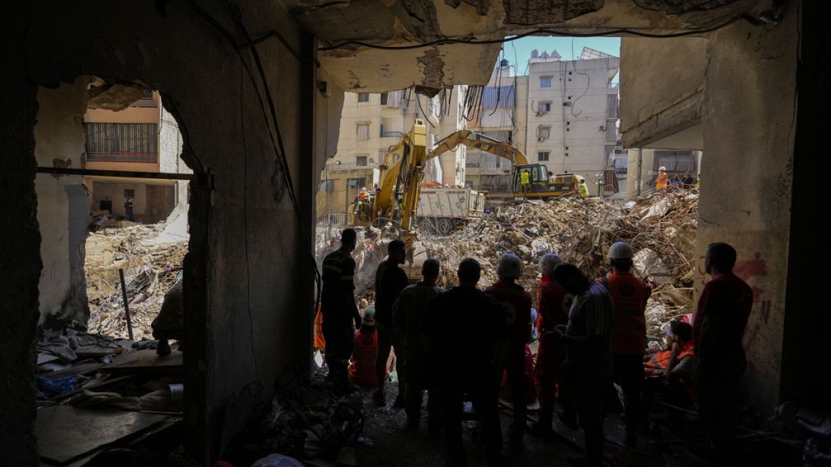 Ambulances arrive to evacuate the wounded near the site of an Israeli airstrike in Beirut