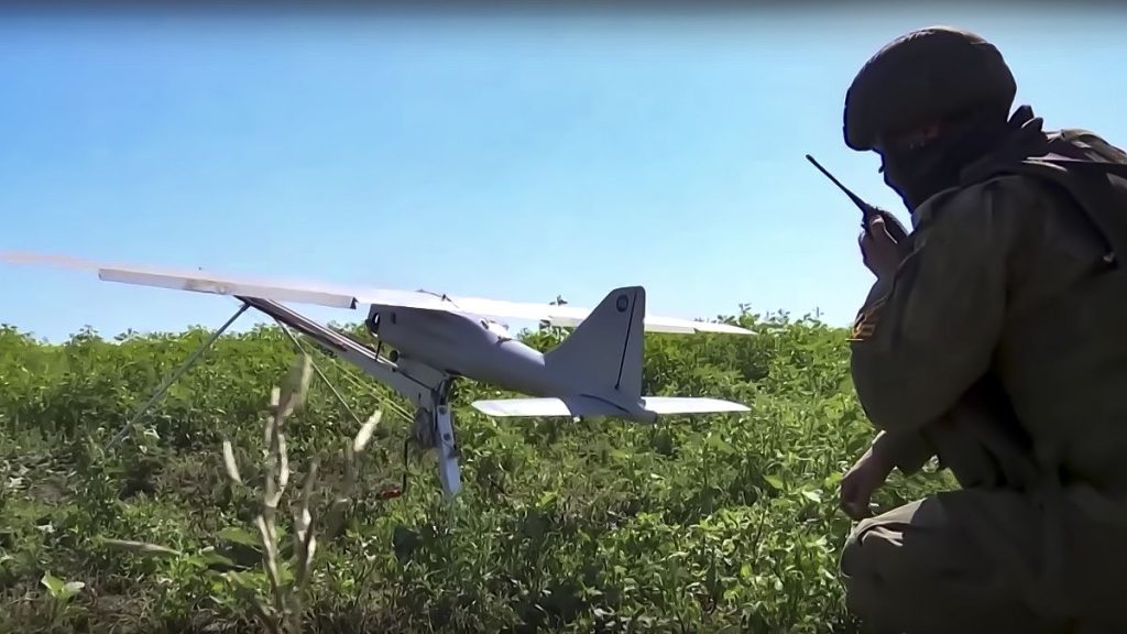 Russian serviceman preparing a Orlan-10 reconnaissance drone to launch at an undisclosed location. (Russian Defense Ministry Press Service photo via AP)