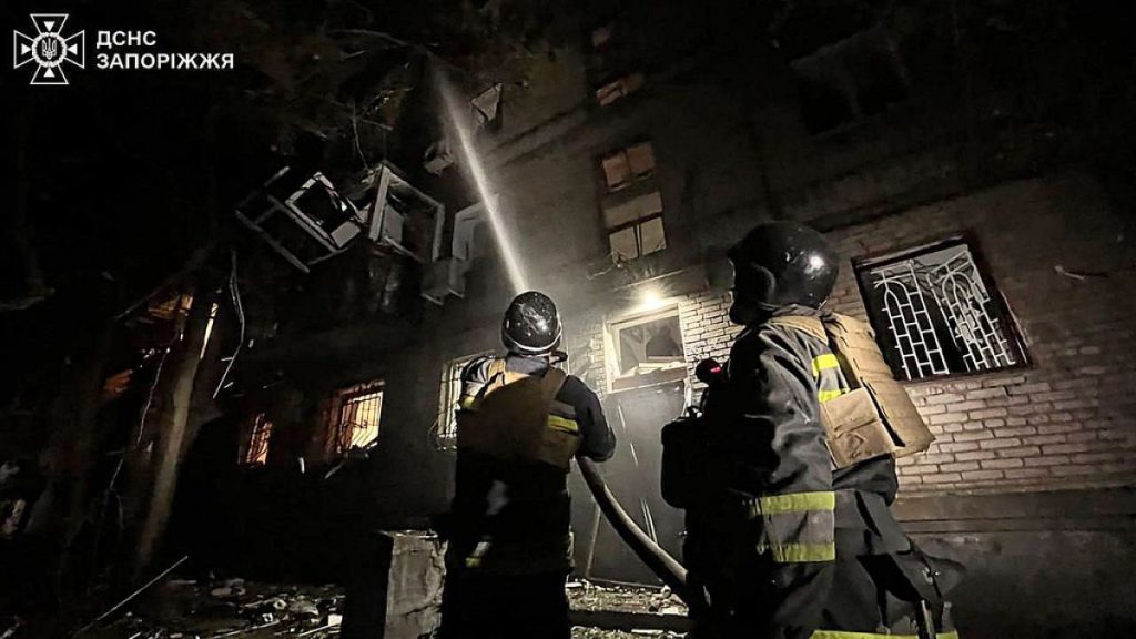 Firefighters work to extinguish a fire after a Russian attack on Zaporizhzhia, Ukraine, on 23 September, 2024.