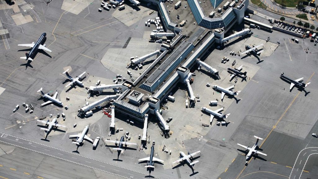 Planes move about a terminal at LaGuardia Airport.