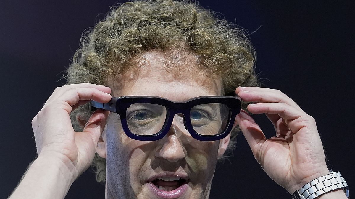 Mark Zuckerberg wears a pair of Orion AR glasses during the Meta Connect conference Wednesday, Sept. 25, 2024, in Menlo Park, Calif.