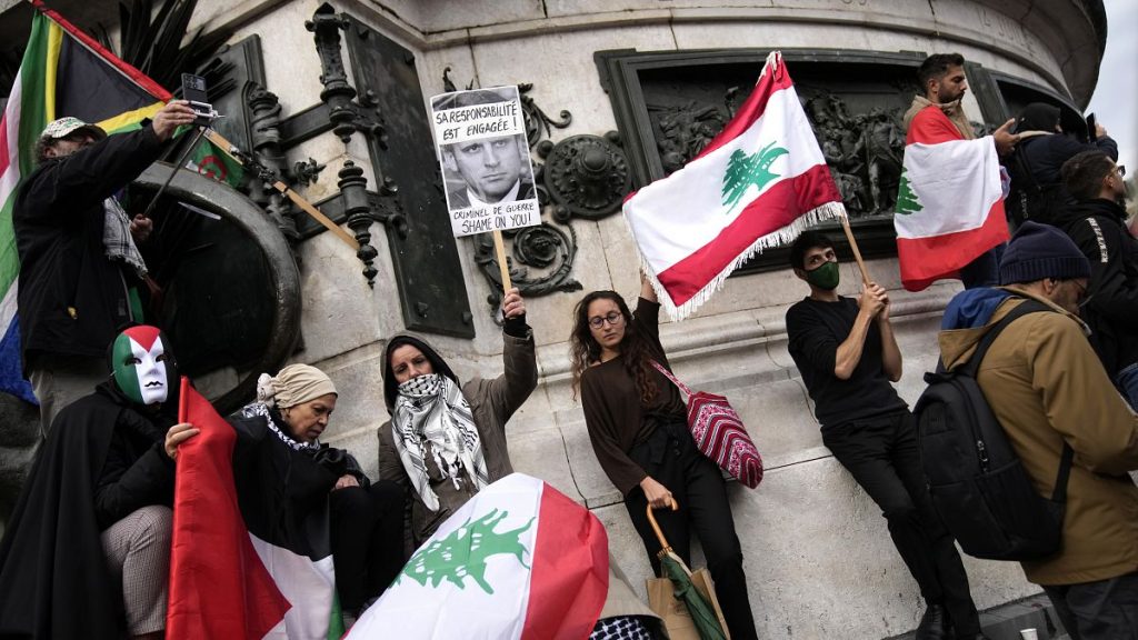 People gather during a pro-Lebanon protest as Israeli airstrikes have intensified in Lebanon