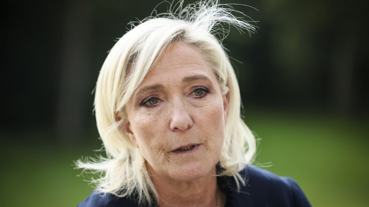 French far-right leader Marine Le Pen answers reporters at the Elysee Palace after a meeting with French President Emmanuel Macron, Aug. 26, 2024 in Paris