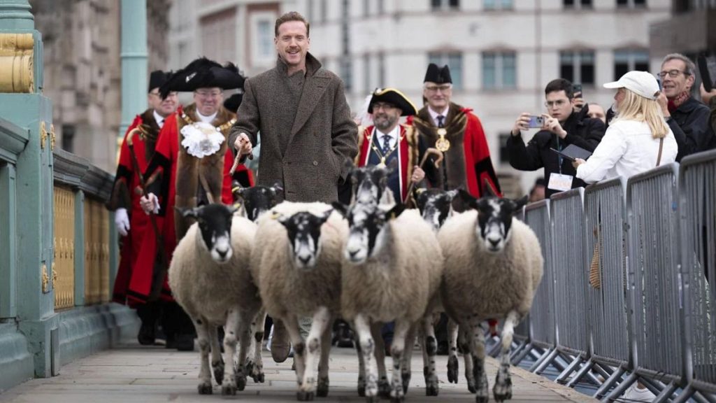 Damian Lewis drives sheep over Southwark Bridge in London