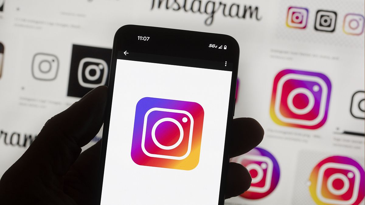 The Instagram logo is seen on a cell phone in Boston, Oct. 14, 2022.