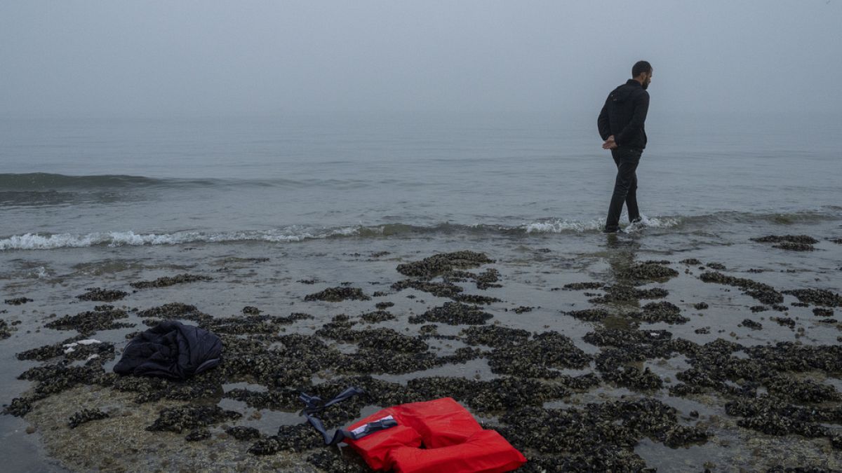 A Kurdish migrant who failed in his attempt to reach the United Kingdom by boat walks back to the town of Ambleteuse, in northern France, on Sunday, May 19, 2024