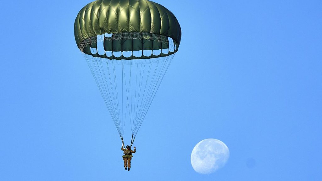 Parachutists jump over Ginkel Heath Netherlands, Sept. 21, 2024, to mark the 80th anniversary of an audacious by unsuccessful World War II mission codenamed Market Garden.