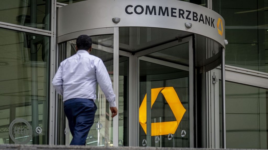 A man walks towards the entrance of the headquarters of the Commerzbank in Frankfurt, Germany. 24 Sept., 2024.