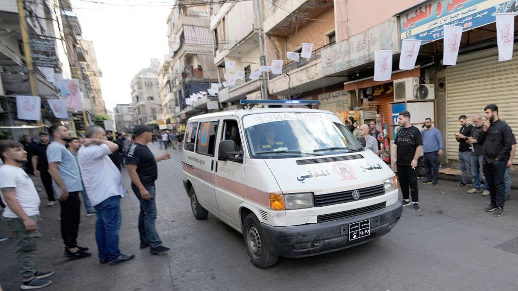 An ambulance believed to be carrying wounded people, after multiple explosions were heard during the funeral of four Hezbollah fighters in Beirut, 18 September 2024