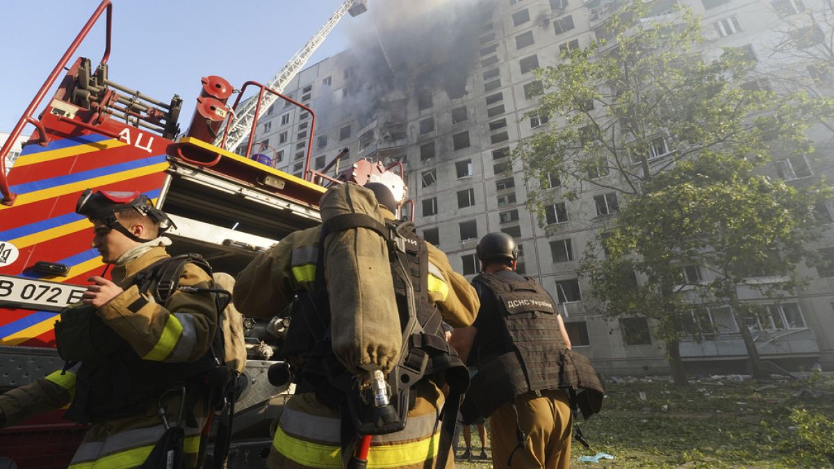 Firefighters tackle a blaze after a Russian aerial bomb struck a multi-story residential building in Kharkiv, Ukraine, Sunday Sept. 15, 2024.