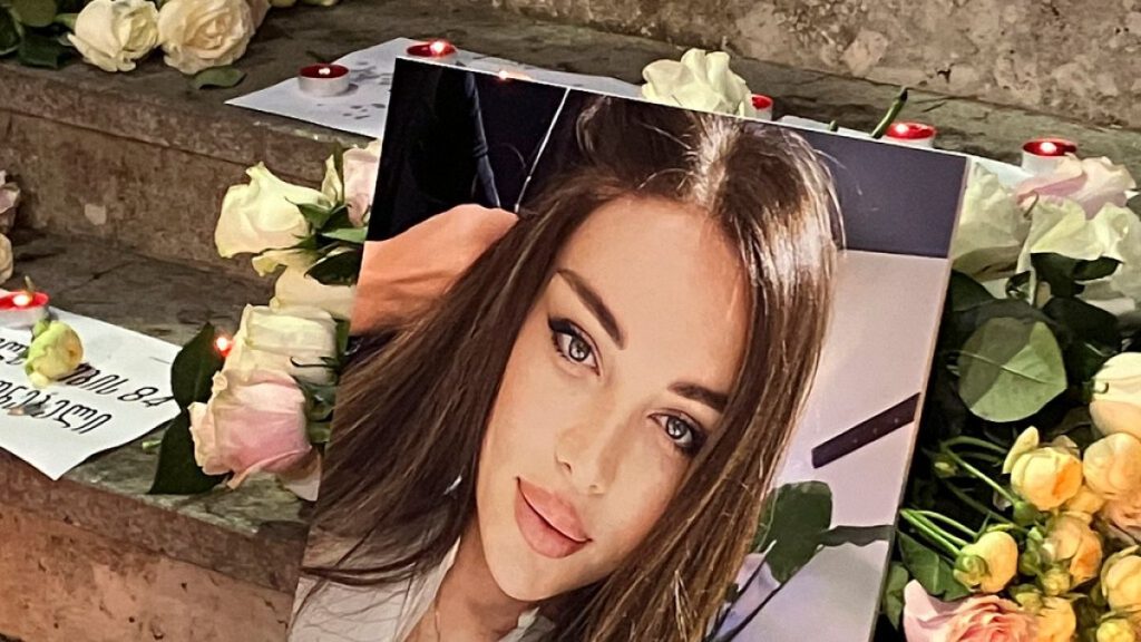 A portrait of Kesaria Abramidze, a transgender actor and model who was stabbed to death, is displayed at a vigil near parliament in Tbilisi, Georgia, Thursday, Sept. 19, 2024.