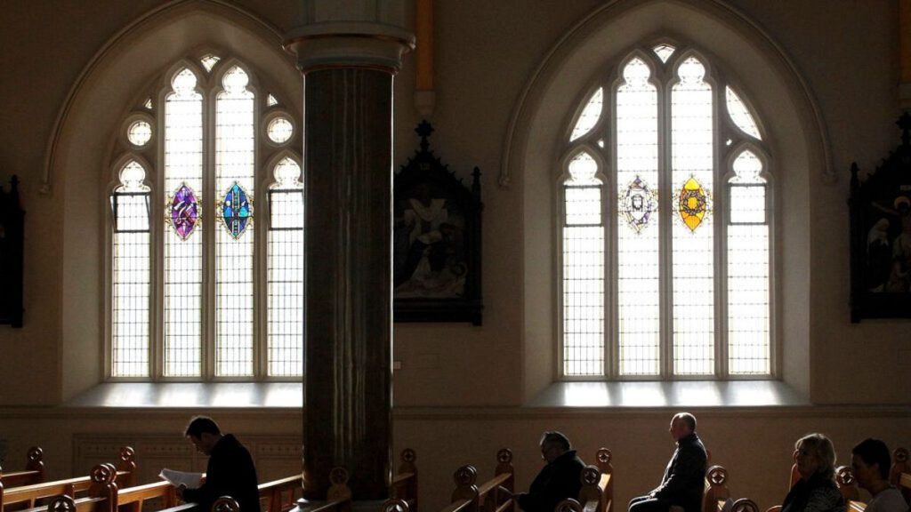 In this March 21, 2010 file phtoo, Roman Catholics listen during mass at St. Peter