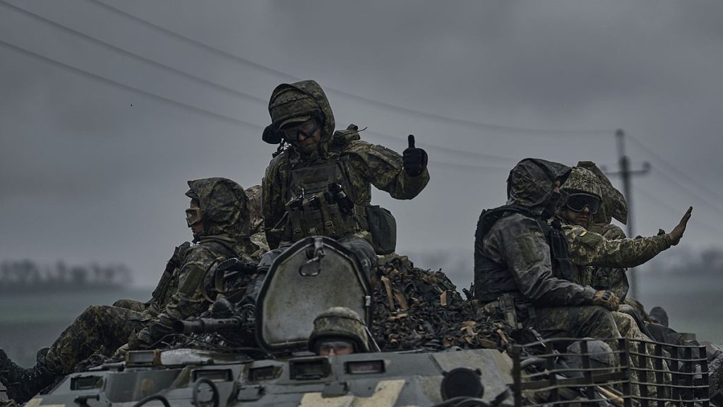 Ukrainian servicemen ride atop by an APC towards frontline positions near Vuhledar, Donetsk region, Ukraine, Monday, May 1, 2023.