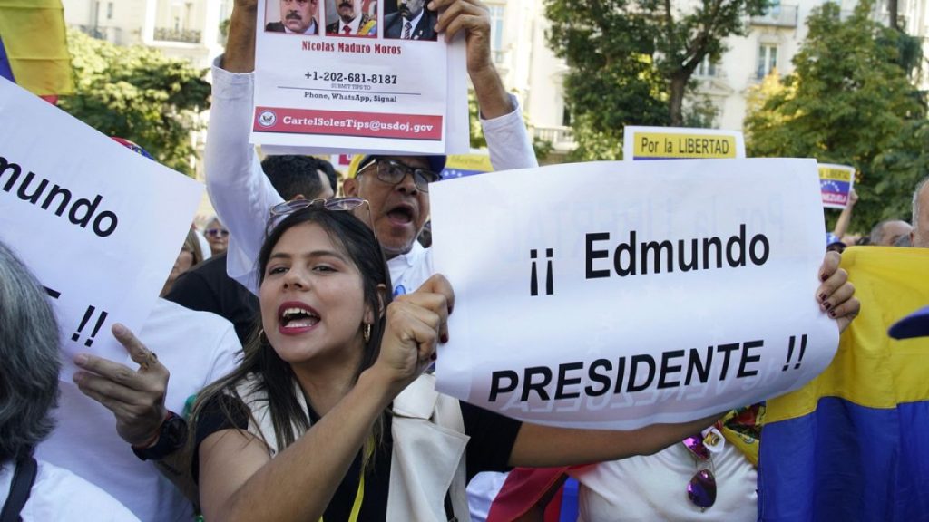 Supporters of Edmundo Gonzalez take part in a protest in Madrid, Spain, Tuesday, Sept. 10, 2024.