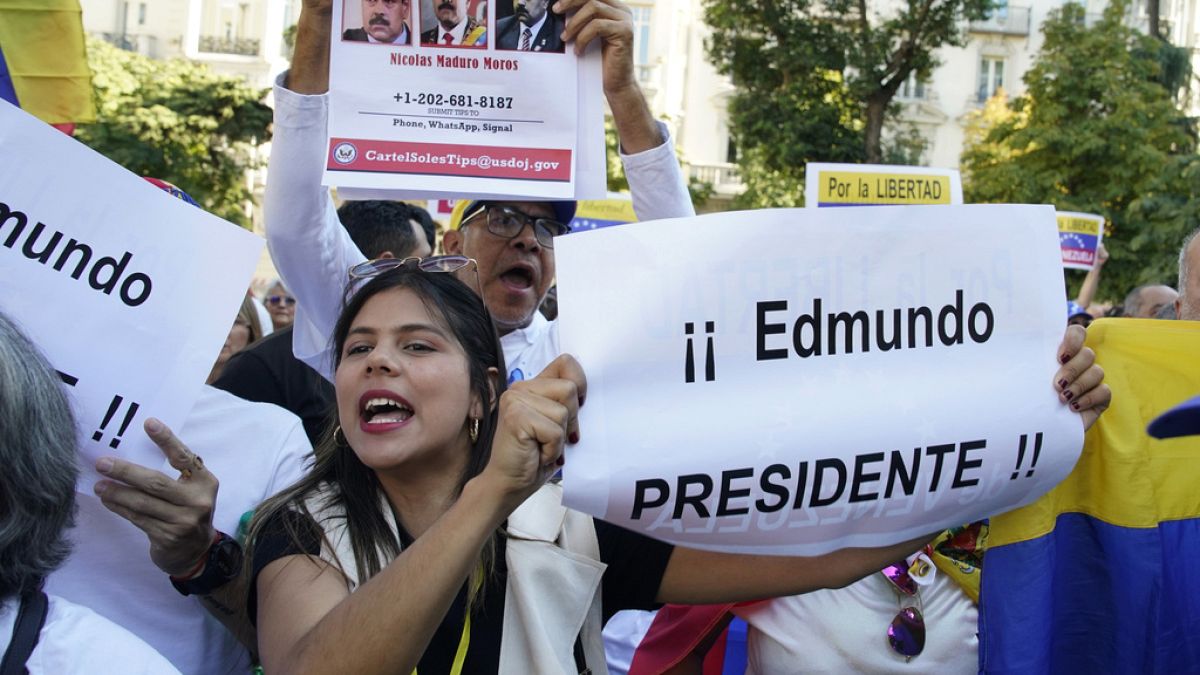 Supporters of Edmundo Gonzalez take part in a protest in Madrid, Spain, Tuesday, Sept. 10, 2024.