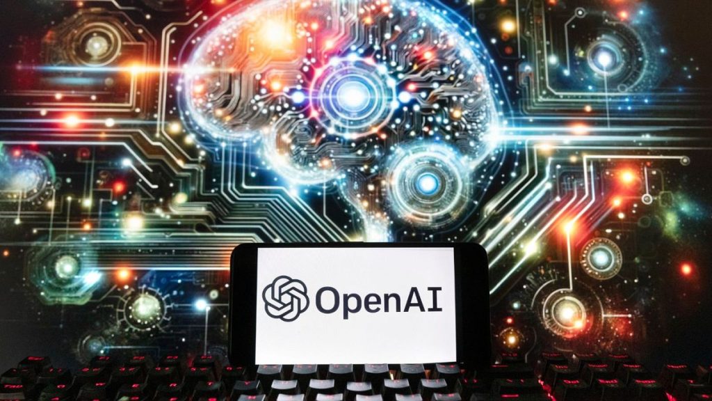 FILE - The OpenAI logo is displayed on a cell phone with an image on a computer screen generated by ChatGPT