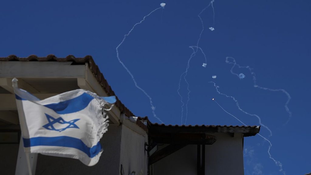 The Israeli Iron Dome air defense system fires to intercept rockets that were launched from Lebanon, as seen from Safed, northern Israel, on Saturday, Sept. 28, 2024.