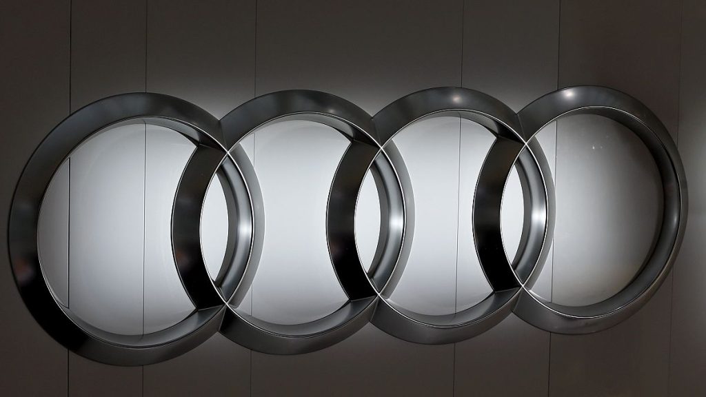 The four ring logo of German car producer Audi is photographed during the annual press conference in Ingolstadt, Germany, Thursday, March 3, 2016. (AP Photo/Matthias Schrader)