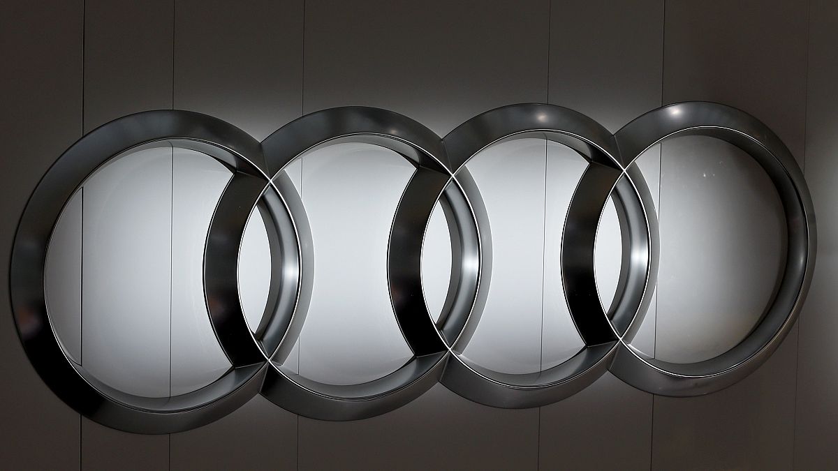 The four ring logo of German car producer Audi is photographed during the annual press conference in Ingolstadt, Germany, Thursday, March 3, 2016. (AP Photo/Matthias Schrader)