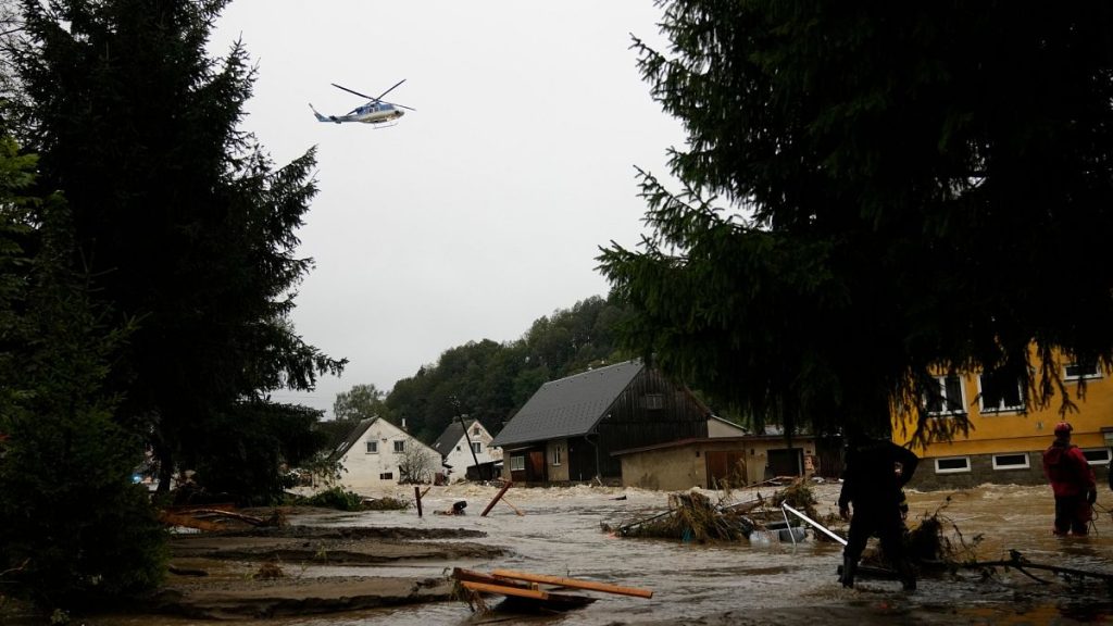 A helicopter hovers over flooded houses in Jesenik, Czech Republic.