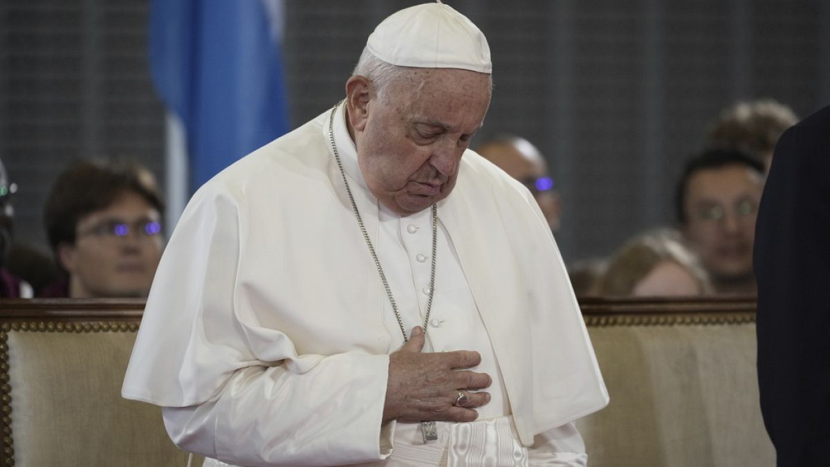 Pope Francis attends the welcome ceremony upon his arrival at Findel International Airport in Luxembourg, Thursday, Sept. 26, 2024