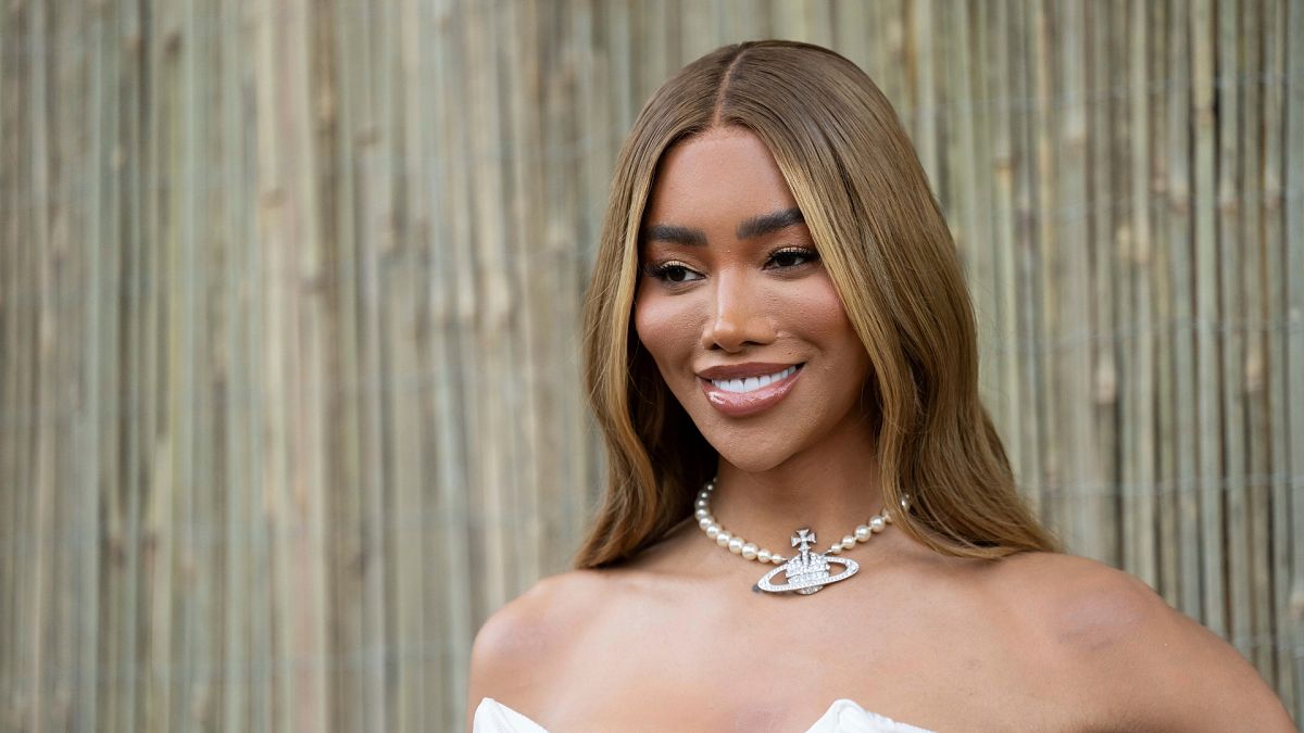 Munroe Bergdorf poses for photographers upon arrival at the Serpentine Summer Party, Tuesday, June 25, 2024 in London.