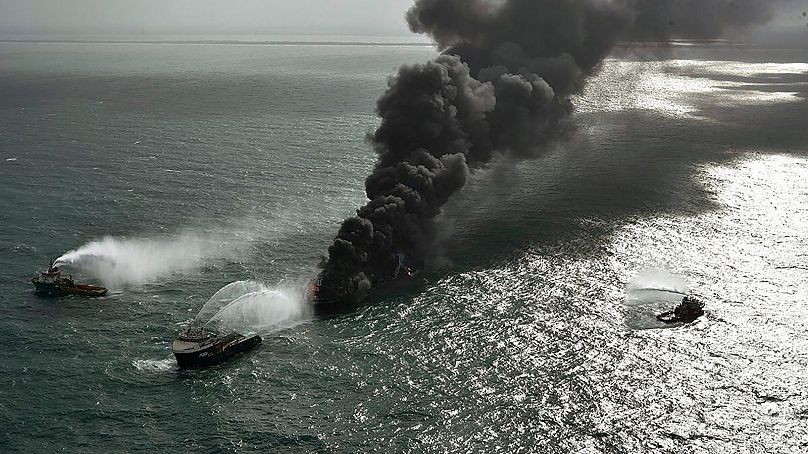 Smoke rises from the container vessel X-Press Pearl engulfed in flames off Colombo port, Sri Lanka, 26 May 2021. 