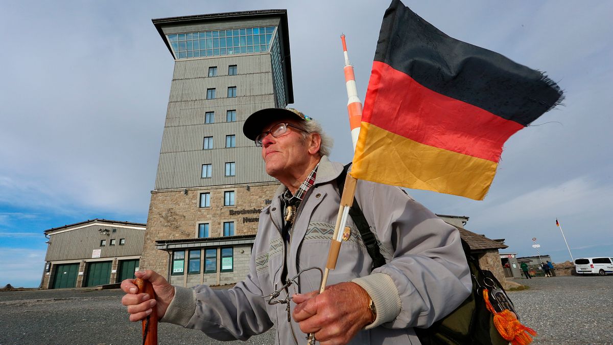 FILE - Benno Schmidt hikes to the Brocken on German Unity Day, Schierke, Germany, on 3 October, 2020.