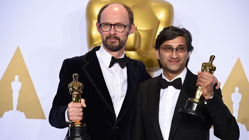 James Gay-Rees, left, and Asif Kapadia, right, with their Oscars for Best Documentary Feature for 'Amy' - February 2016